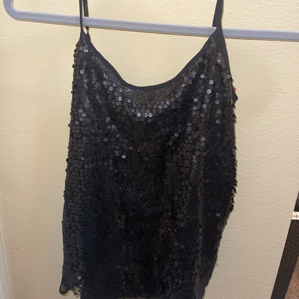 Sequin tank top brand new with tags, relaxed fit and adjustable straps.